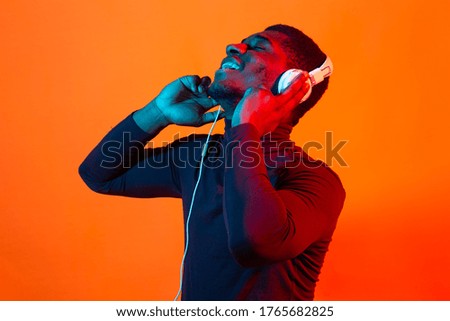 Similar – Image, Stock Photo Play of light and shadow with a young man