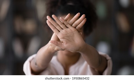 African American Young Woman Show Stop Or No Hand Gesture Or Sign Protest Against Racial Or Gender Discrimination. Biracial Female Demonstrate Object Against Domestic Violence Or Abortion.