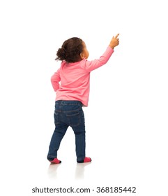 African Baby Girl Pointing Finger To Something