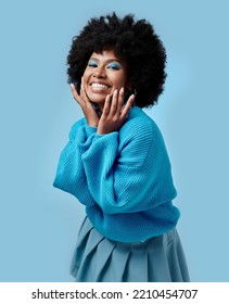 African Beauty, Makeup And Portrait Of A Black Woman With Blue Eyes Shadow, Face Cosmetics And Afro Hair Or Good Skin. Funk, Smile And Young Happy Girl With Vintage, Retro And Creative Fashion Style.