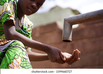 African Black Girl Washing Hands As Hygiene Symbol