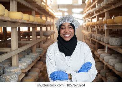 African black muslim business woman in local cheese production company - Powered by Shutterstock