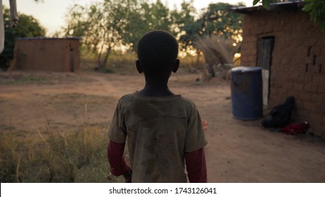 African Boy Walking. Zambia, Africa
