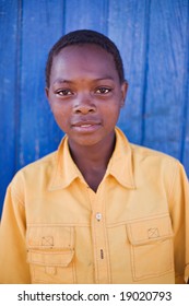 boy with yellow shirt