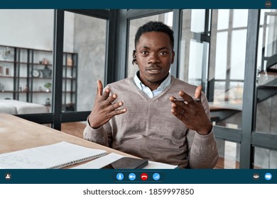 African Business Man Coach, Executive Wearing Headset Talking To Camera Conference Video Calling, Giving Webinar, Online Class, Distance Teaching By Videoconference, Web Cam View. Headshot, Screenshot