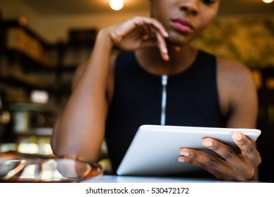 African Business Woman Working On Tablet In The Cafe At Lunch, Close Up