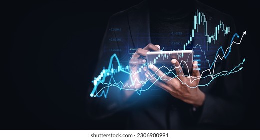 African businessman hands with tablet, double exposure forex diagrams and candlesticks. Stock market chart with numbers and arrow rising. Concept of online trading and investment