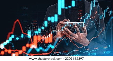 African businessman hands working in tablet, double exposure forex diagrams and candlesticks. Stock market chart with numbers and arrow rising. Concept of online trading and mobile app