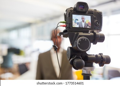 African Businessman Recording Video For An Interview Or Reportage