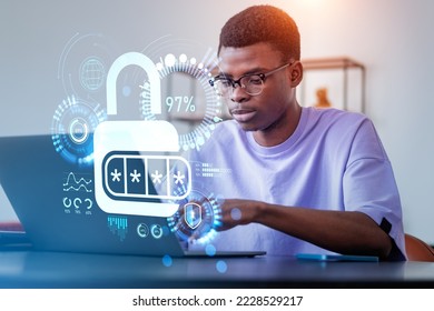 African businessman using laptop, lock hud hologram with hidden password, percentage circles and shield with lines. Concept of cybersecurity and protection