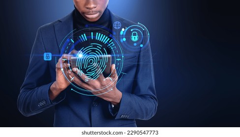 African businessman working with tablet, glowing fingerprint hud hologram with cybersecurity and padlock icon. Concept of biometric verification and data privacy - Powered by Shutterstock