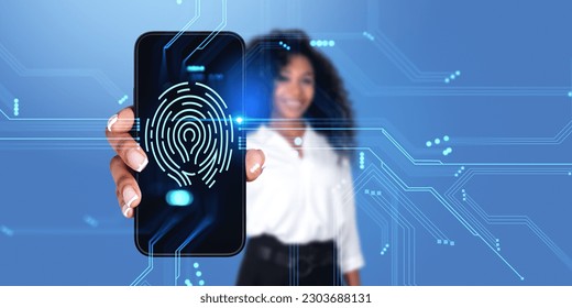 African businesswoman holding a phone with glowing fingerprint hud on screen, hologram with cybersecurity and data access. Concept of internet security and biometric identification
