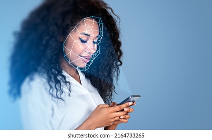 African businesswoman smiling and typing in phone, biometric verification and facial recognition. Unlocking smartphone with scanner. Concept of artificial intelligence - Powered by Shutterstock