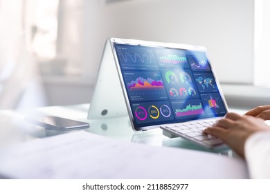 African Businesswoman Using Analytics Data KPI Dashboard Tech - Shutterstock ID 2118852977