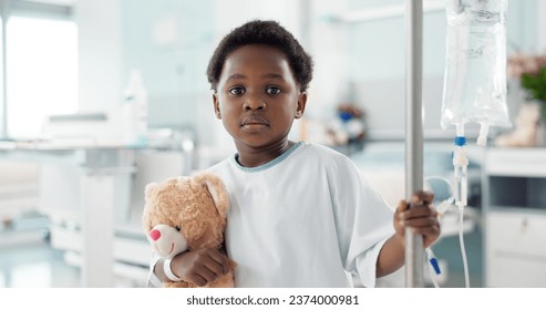 African child, sick in hospital and teddy bear for healthcare, wellness or treatment on iv drip. Portrait, serious and face of kid in pediatric clinic with toys for recovery from surgery or healing - Powered by Shutterstock