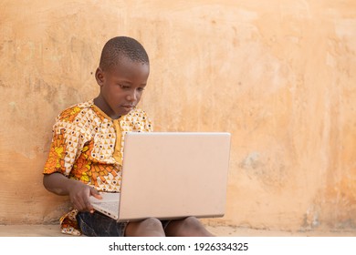 African Child Using A Laptop Computer