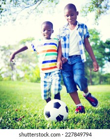 African Children Playing Exercise Football Concept