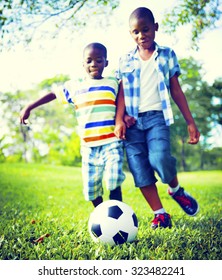 African Children Playing Exercise Football Concept