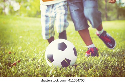 African Children Playing Exercise Football Concept