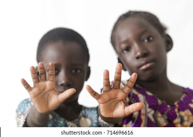 African children showing hand palms as a stop sign, isolated on 