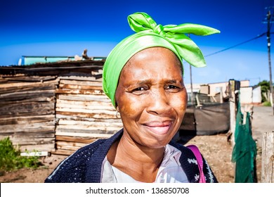 african colored woman wearing a lime green head wrap