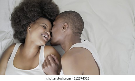 African couple in bed