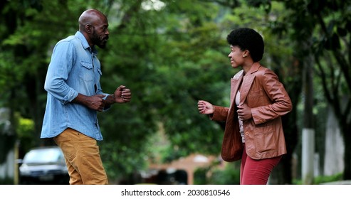 African Couple Dancing Outside In Street