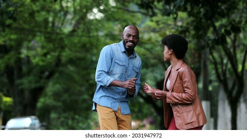 African Couple Dancing Outside In Street