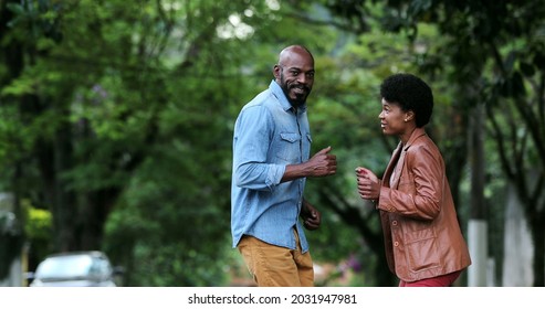 African Couple Dancing Outside In Street