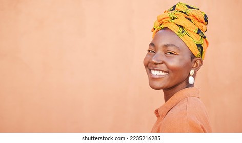 African, culture and portrait of happy black woman with pride in unique tradition, origin and South Africa heritage. Fashion mock up, head wrap and face of beauty girl isolated on mockup orange wall - Shutterstock ID 2235216285