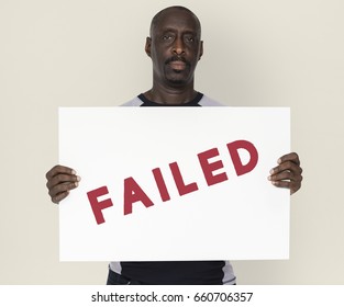 African Descent Man Holding Placard