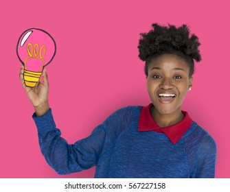 African Descent Woman Smiling Holding Light Stock Photo 567227158 ...