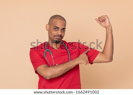 African doctor wearing a red uniform on a yellow background