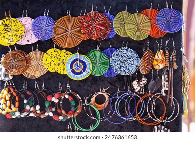 african earrings colorful beads crafted  display - Powered by Shutterstock