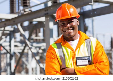 African Electrical Worker In Electric Substation