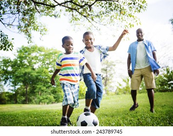 African Family Happiness Holiday Vacation Activity Concept - Powered by Shutterstock