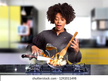 African Female Cooking With Magic Against Kitchen Background - Image