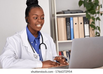 African Female Doctor Consulting Patient Make Online Webcam Video Call On Laptop. Black Woman Therapist Videoconferencing In Remote Computer Healthcare Telemedicine Virtual Chat. Telehealth Videocall.