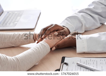 Similar – Image, Stock Photo Medic giving bad diagnosis to patient