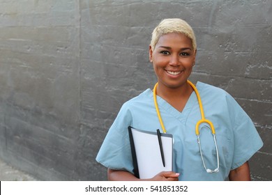 African female doctor isolated on gray
