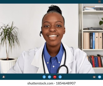 African Female Doctor Talking To Web Cam Consulting Patient In Virtual Telemedicine Chat Online Telehealth Video Call, Remote Appointment Tele Health Meeting. Webcam View. Videocall App Screenshot