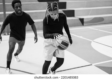 African Friends Playing Basketball Outdoor - Focus On Girl Face - Black And White Editing