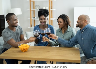 African Friends Red Wine Toast Cheers During Celebration