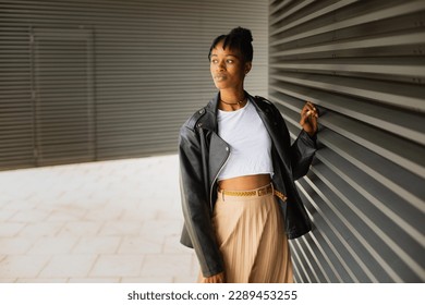 African girl with black jacket - Powered by Shutterstock