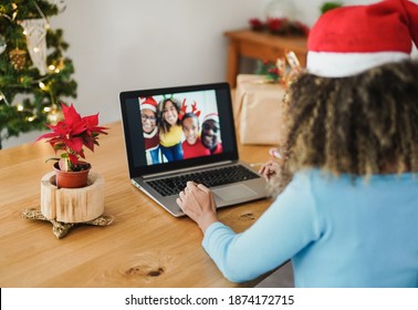 African Girl Celebrate Christmas With Family On A Video Call - Social Distance And Coronaviurs - Christmas Tree And Present In Background