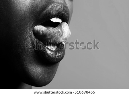 African Girl Tongue Stuck Out Showing Piercing Black And White African Girl Tongue Stuck Out Showing Piercing Black And White