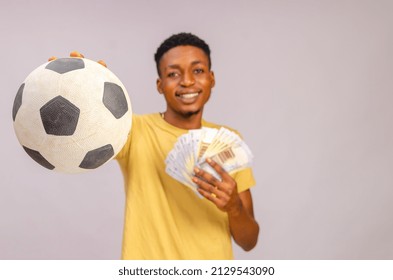 african guy isolated over white background pointing his ball forward - Powered by Shutterstock