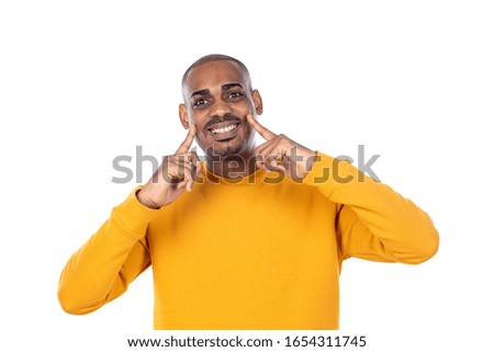 African guy with yellow T-shirt isolated on a white background