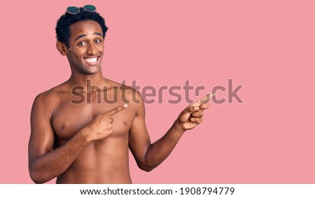 Similar – Image, Stock Photo Black man in swimsuit sitting on sandy beach