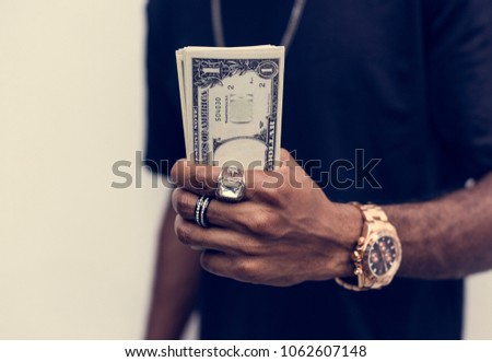 African holding cash